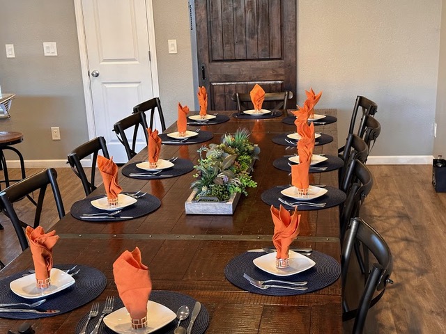 Elegant Table Setting: Sophisticated table setting for a private in-home dinner